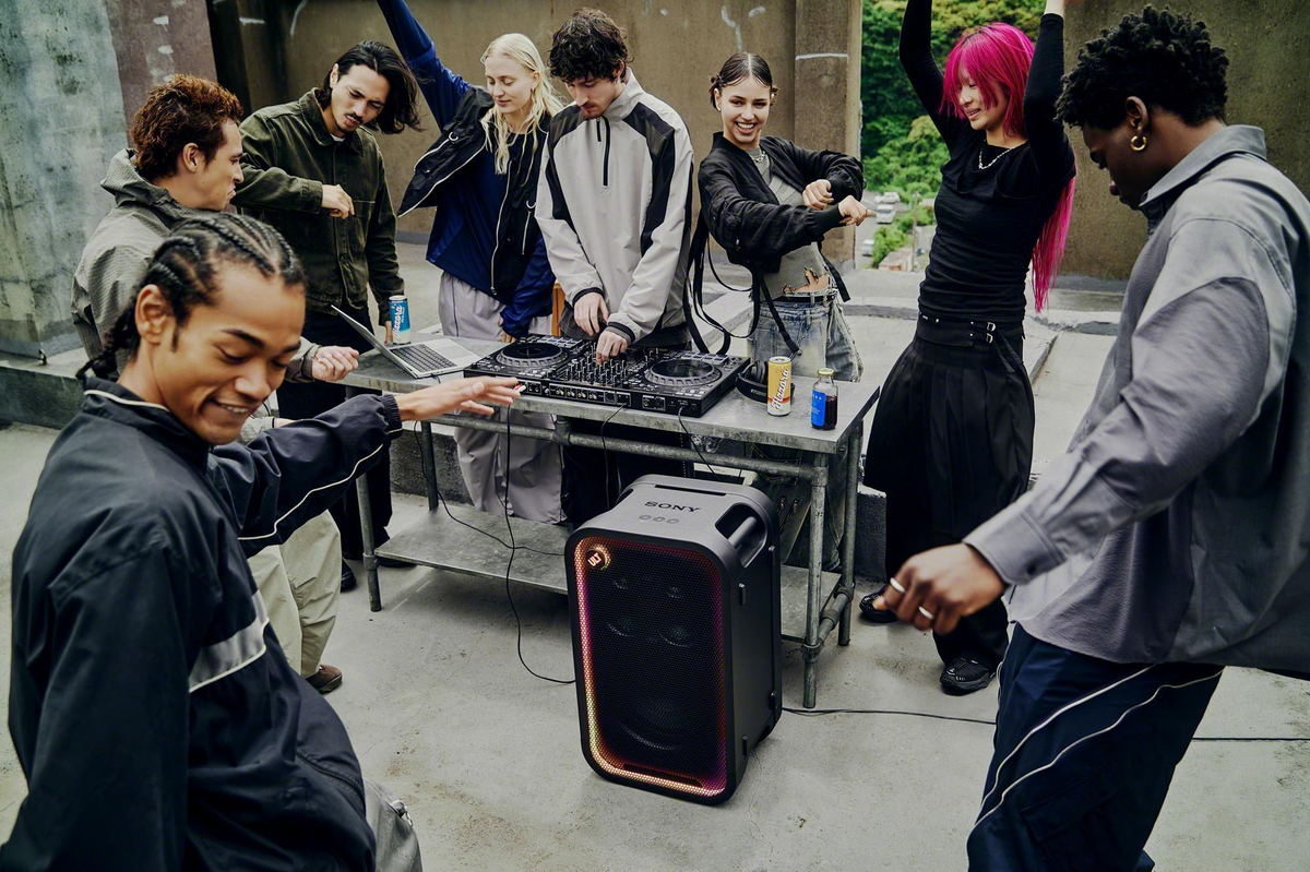 Sony ULT Tower 7 speaker at an outdoor party with DJ gear